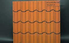 Цветни слънчеви панели с шарки имитират керемиди или фасадна зидария